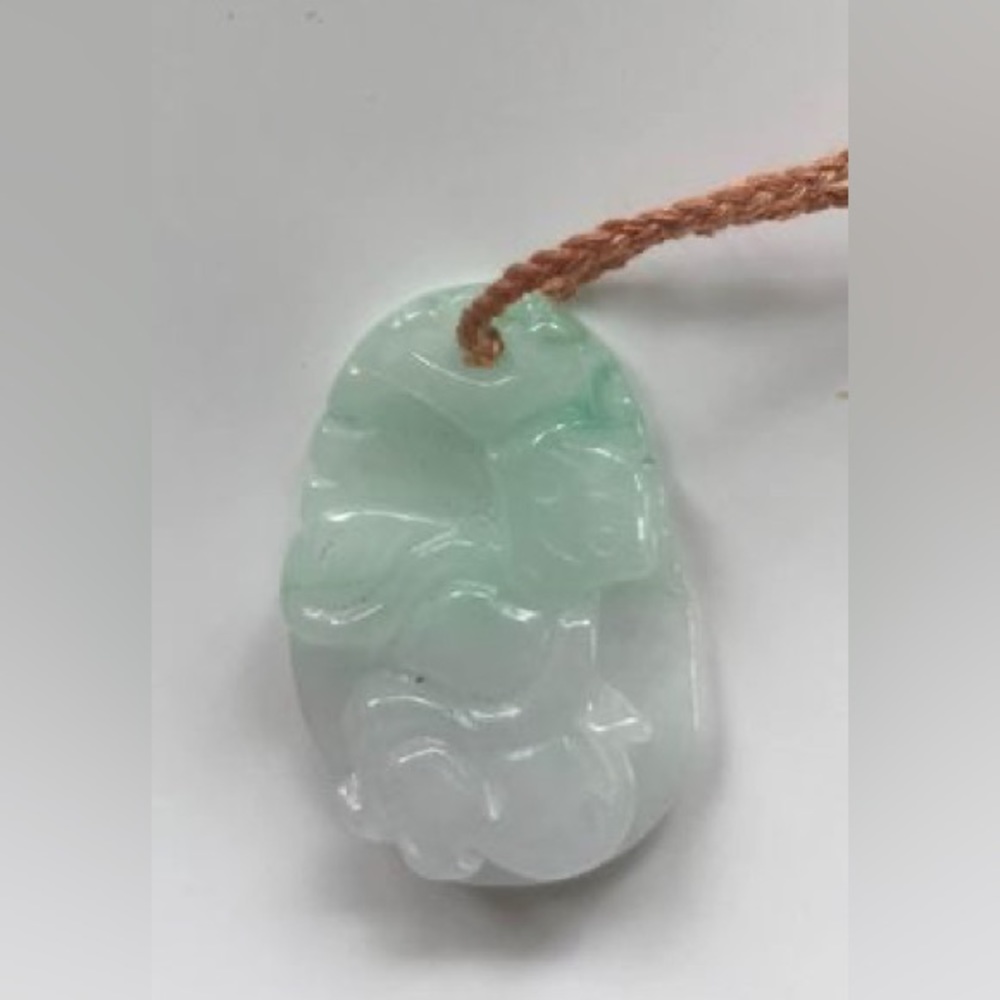 Monkey Jade pendant with hand woven string